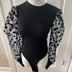 Never been worn black bodysuit with mesh polka dot sleeves